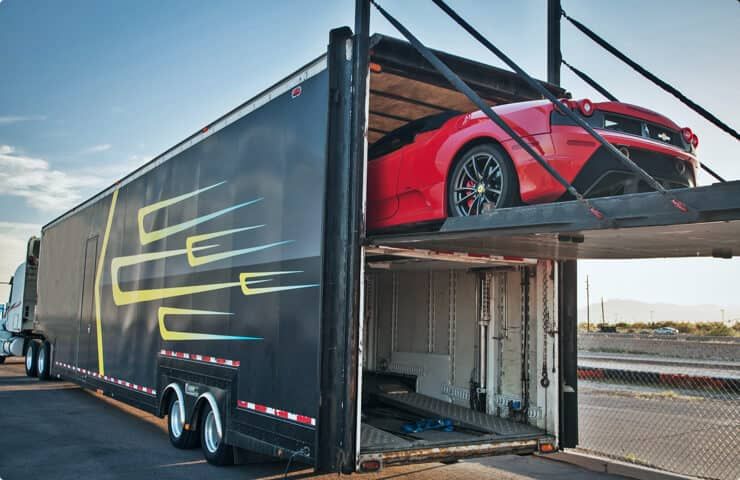 alt= "Image displaying enclosed luxury car shipping"